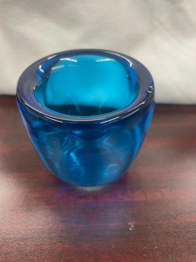 Where to find Votive Holder - Turquoise Glass in Grand Cayman